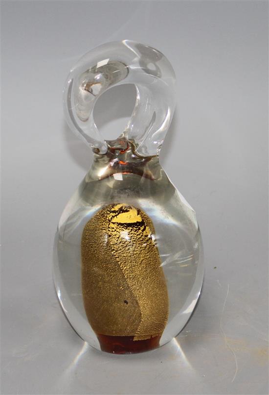 A Mdina? coloured glass paperweight, with loop handle, height 19cm